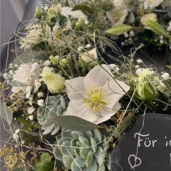 Tröstender Blumenkranz
